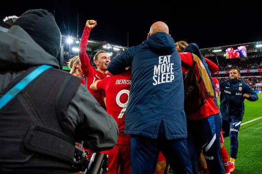 Fredrik Aursnes of Norway celebrates with staff and