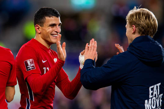 Mohamed Elyounoussi and Mats Møller Dæhli of Norway