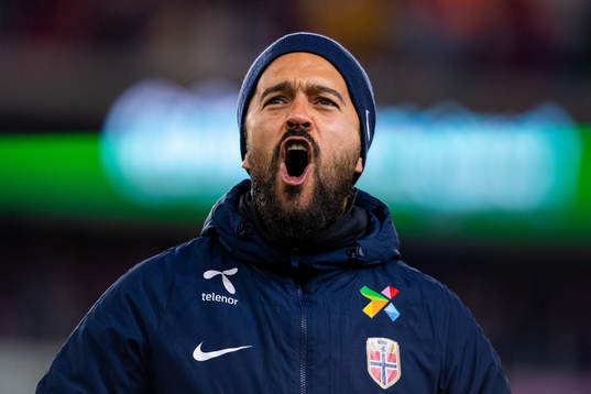 Bernardo Cueva, tactical statistician of Norway, celebrates