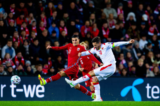 Mohamed Elyounoussi of Norway and Stevan Jovetic of