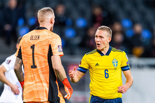 Goalkeeper Robin Olsen and Ludwig Augustinsson of Sweden