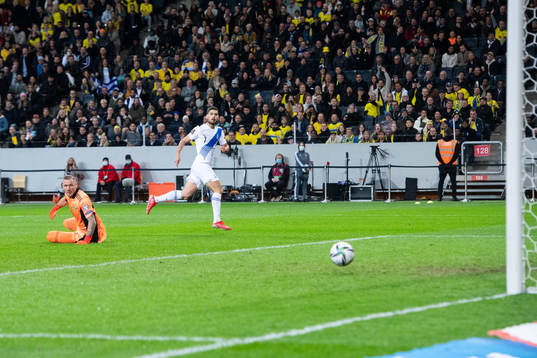 Goalkeeper Robin Olsen of Sweden and Giorgos Masouras of