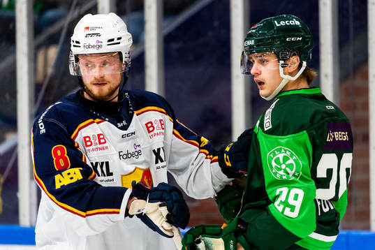 Djurgårdens Linus Arnesson och Färjestads Lucas Forsell