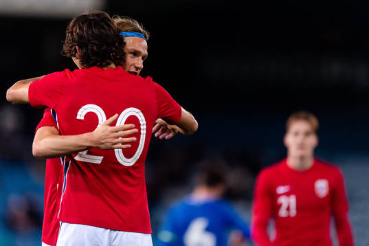 Martin Njøten Palumbo and Erik Botheim of Norway celebrate