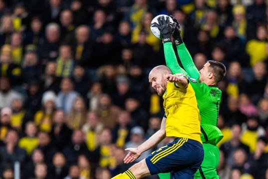 Marcus Danielson of Sweden and goalkeeper Odisseas