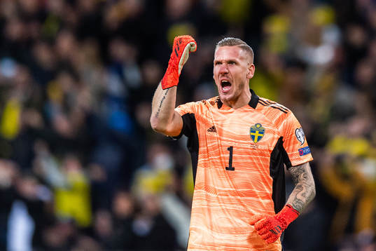 Goalkeeper Robin Olsen of Sweden celebrates