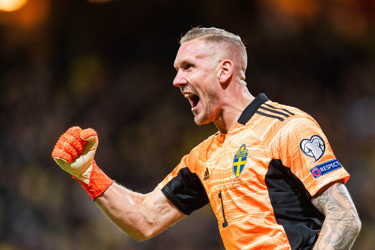 Goalkeeper Robin Olsen of Sweden celebrates