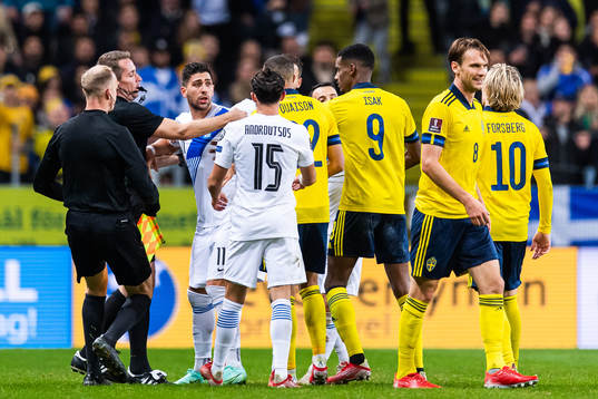 Tasos Bakasetas of Greece and Robin Quaison of Sweden