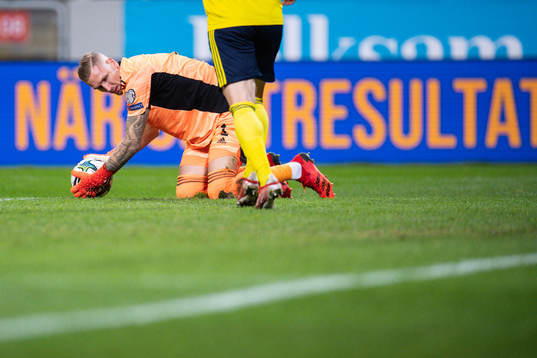 goalkeeper Robin Olsen of Sweden with a patch of grass