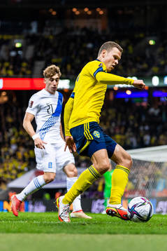 Kostas Tsimikas of Greece and Viktor Claesson of Sweden