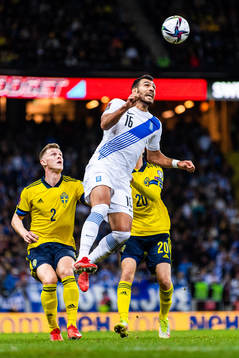 Emil Krafth and Kristoffer Olsson of Sweden compete for the