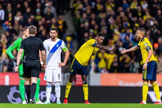 Alexander Isak and Robin Quaison of Sweden celebrate the