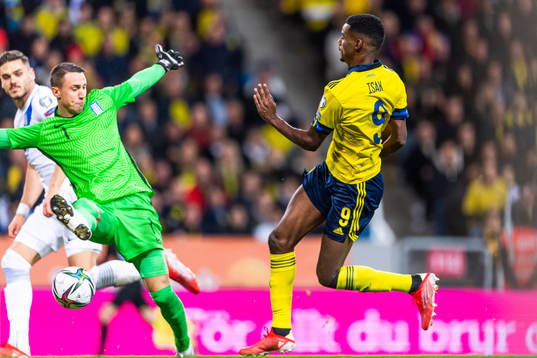 Goalkeeper Odisseas Vlachidimos of Greece concedes the 2-0