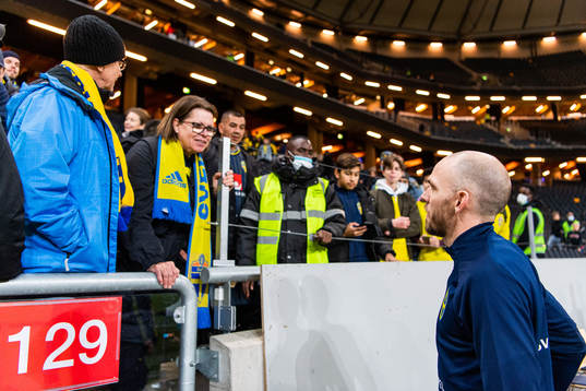 Marcus Danielson of Sweden talks to his family