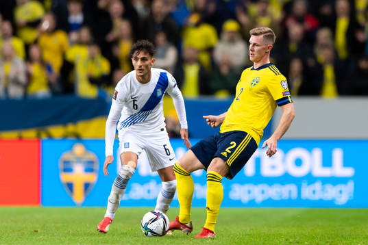 Dimitris Giannoulis of Greece and Emil Krafth of Sweden