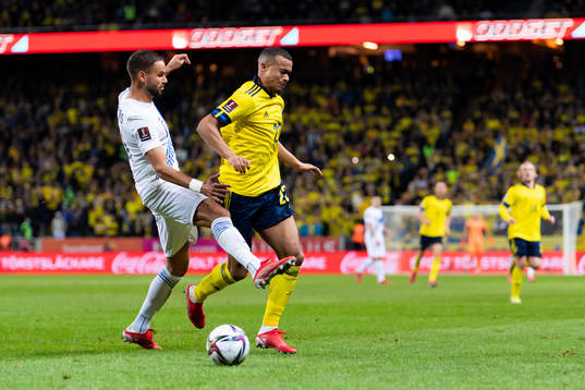 Pantelis Hatzidiakos of Greece and Robin Quaison of Sweden