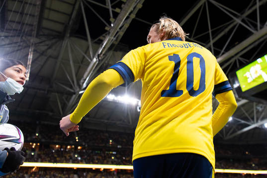 Emil Forsberg of Sweden talks to a ball girl