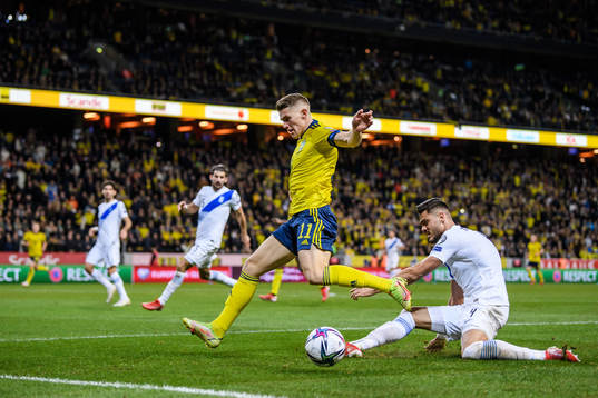 Viktor Gyökeres of Sweden and Konstantinos Mavropanos of