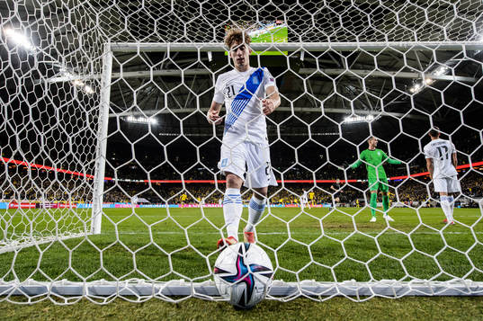 Kostas Tsimikas of Greece looks dejected