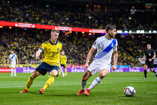 Emil Krafth of Sweden against Giorgos Masouras of Greece