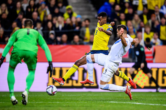 Alexander Isak of Sweden and Konstantinos Mavropanos of