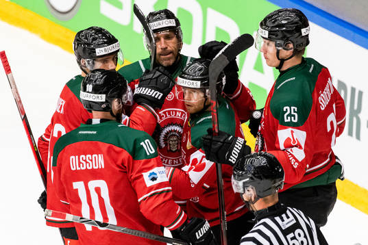 Ryan Lasch of Frölunda (middle) celebrates with team mates