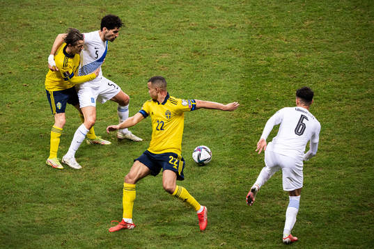 Kristoffer Olsson and Robin Quaison of Sweden against