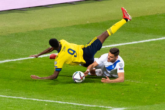 Alexander Isak of Sweden in action with  Konstantinos