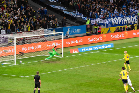Emil Forsberg of Sweden scores 1-0 behind goalkeeper