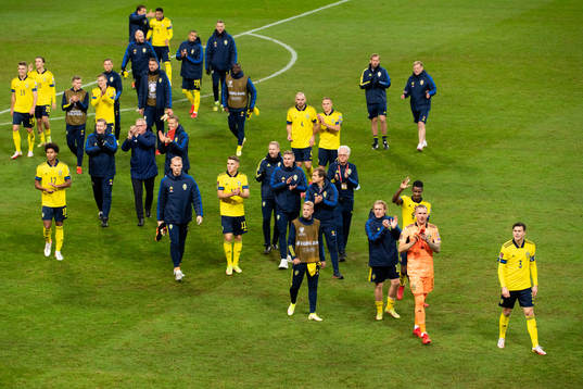 The Swedish team celebrate