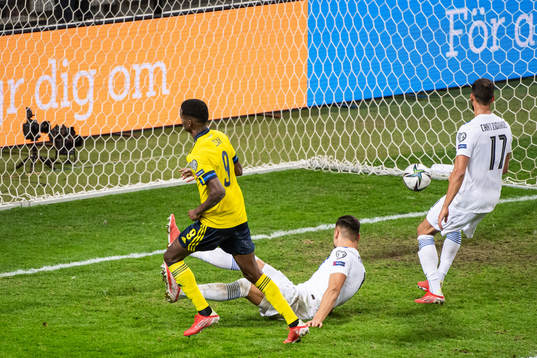 Alexander Isak of Sweden scores the 2-0 goal