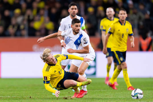 Emil Forsberg of Sweden and Giorgos Masouras of Greece