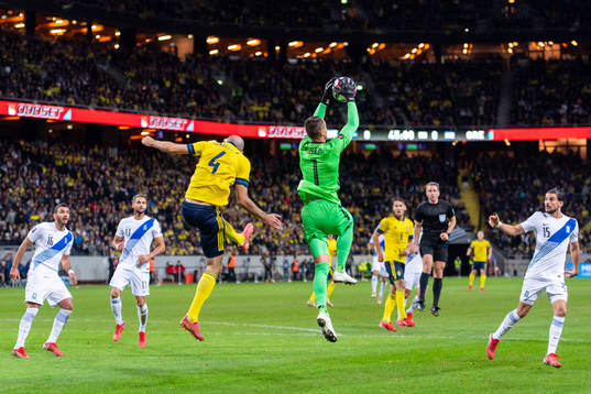 Marcus Danielson of Sweden and goalkeeper Odisseas
