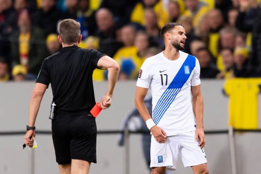 Pantelis Hatzidiakos of Greece receives a second yellow