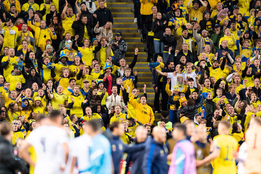 The Swedish supporters celebrate