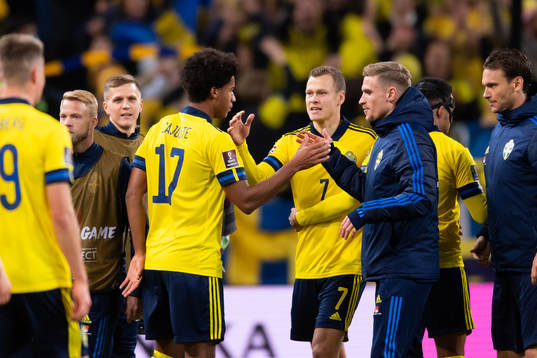 Jens-Lys Cajuste and Viktor Claesson of Sweden celebrate