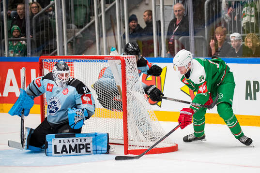 Adam Edström of Rögle against goalkeeper Patrick