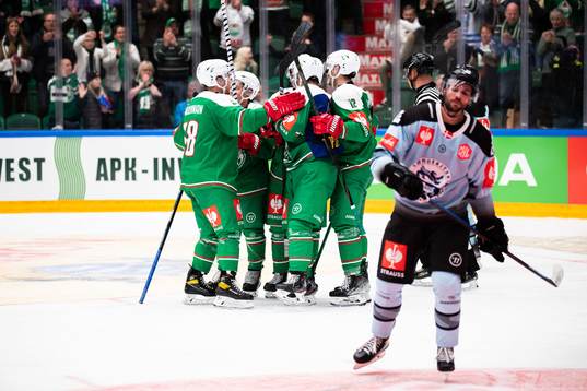 Linus Sjödin of Rögle celebrate with teammates