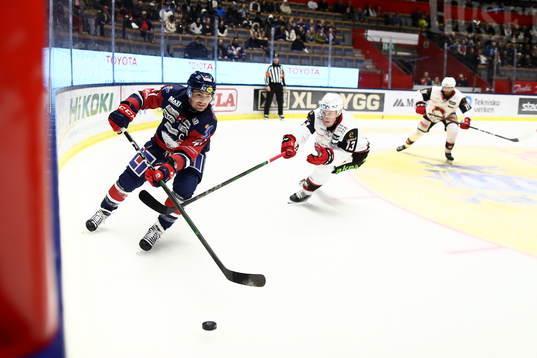 Linköpings Broc Little och Malmö Redhawks Kalle Östman