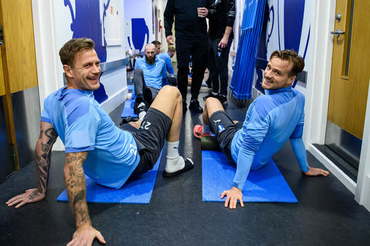 goalkeeper Johan Dahlin and Eric Larsson of Malmö FF