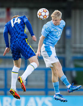 Brodi Hughes of Chelsea and Melker Widell of Malmö FF