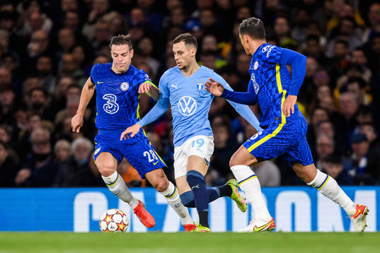 Cesar Azpilicueta of Chelsea against Veljko Birmancevic of