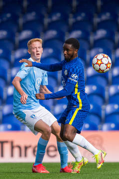 Hugo Larsson of Malmö FF and Dion Rankine of Chelsea
