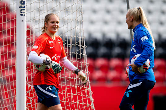 Goalkeeper Aurora Mikalsen and Maria Thorisdottir of the