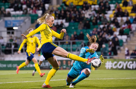 Stina Blackstenius of Sweden and goalkeeper Courtney