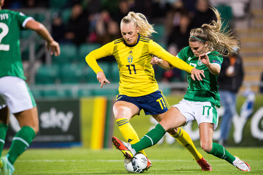 Stina Blackstenius of Sweden and Jamie Finn of Ireland
