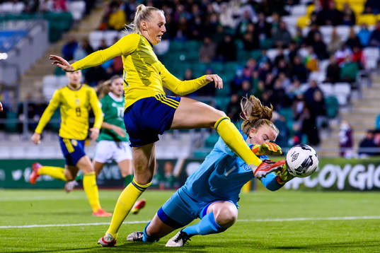 Stina Blackstenius of Sweden and goalkeeper Courtney