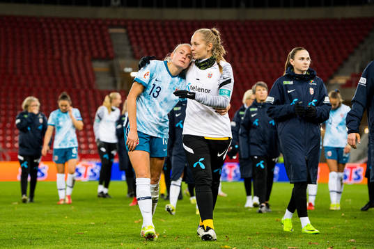 Guro Bergsvand and goalkeeper Aurora Mikalsen of Norway