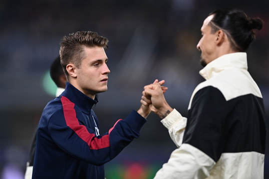 Zlatan Ibrahimovic of Milan and Mattias Svanberg of Bologna