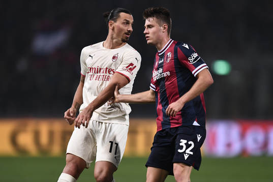 Zlatan Ibrahimovic of Milan and Mattias Svanberg of Bologna